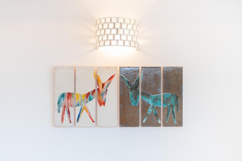 Maiori — Wall art con cervi colorati